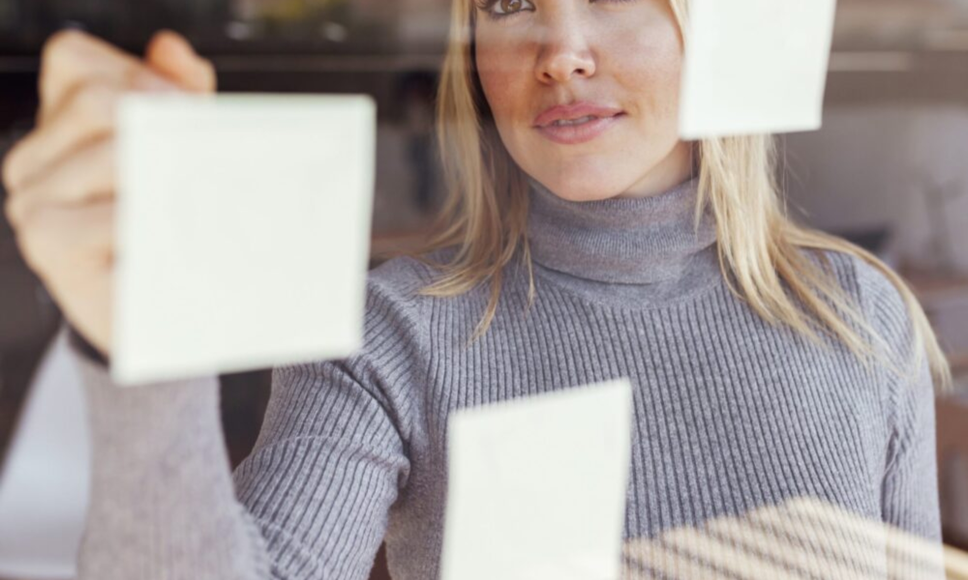 Business woman reviewing financial dashboards in NetSuite ERP after implementation.