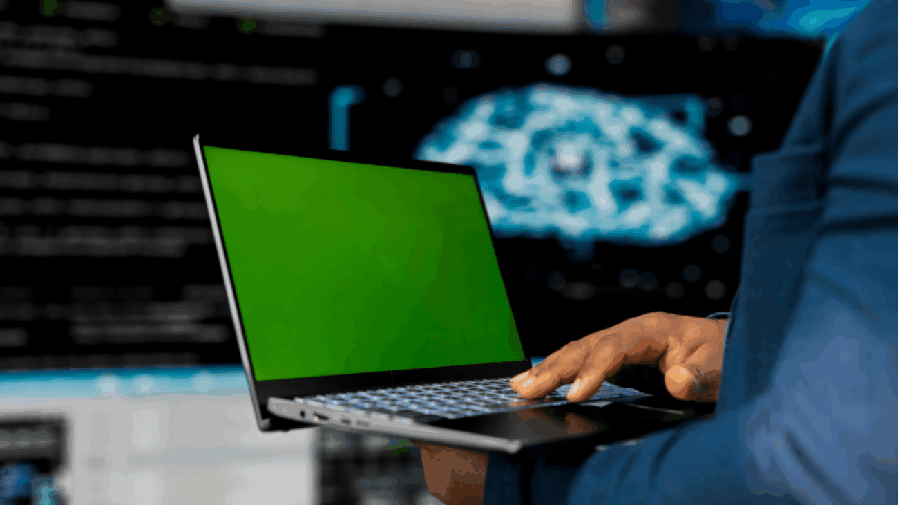 Young engineer using software tools while managing a cloud ERP upgrade