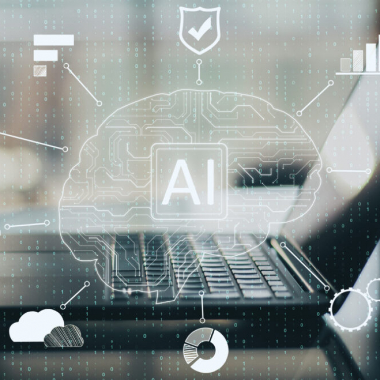 Close-up of laptop with creative AI circuit brain representing NetSuite ERP and embedded intelligence
