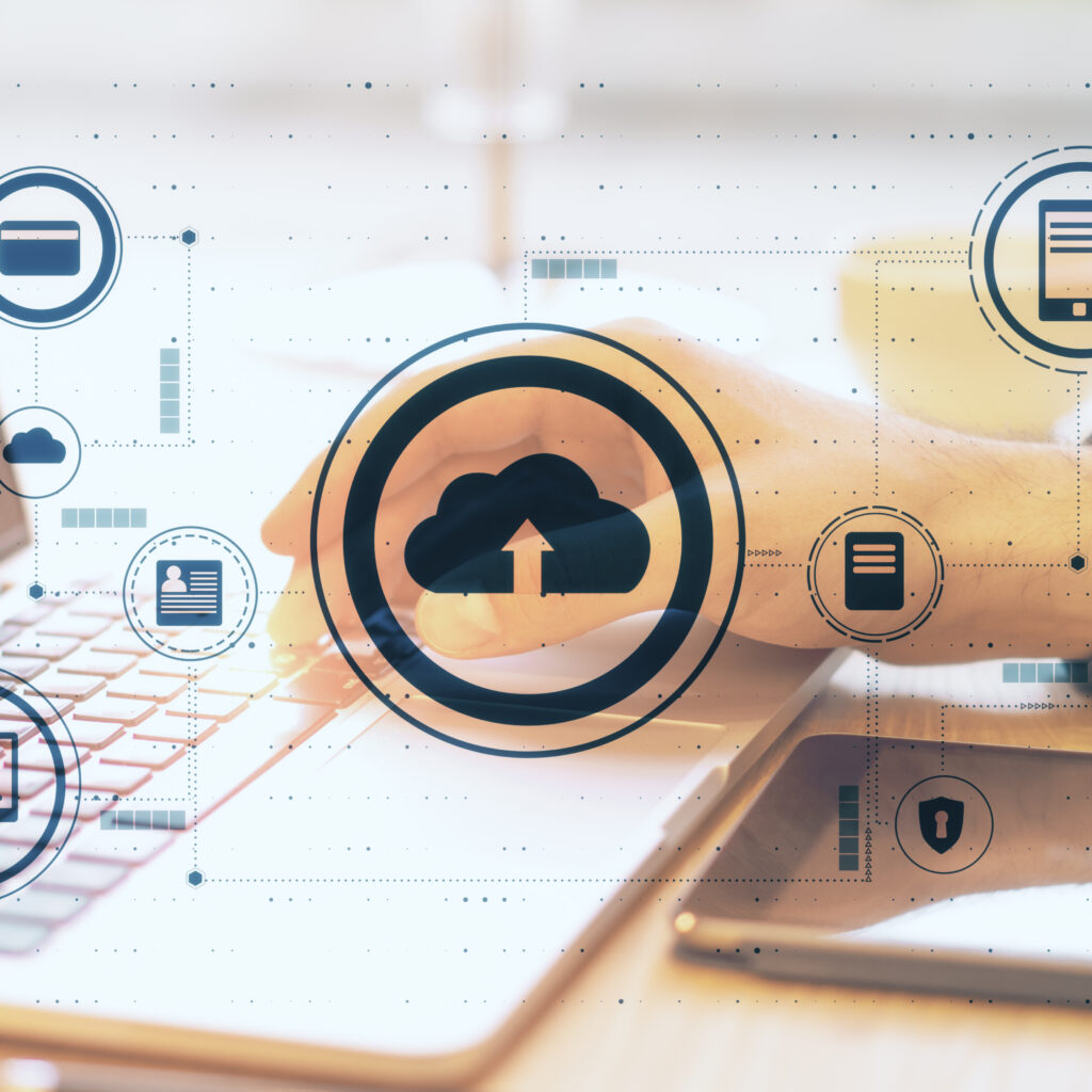 Cloud computing concept with laptop and tablet showing cloud-based ERP dashboard for small business systems